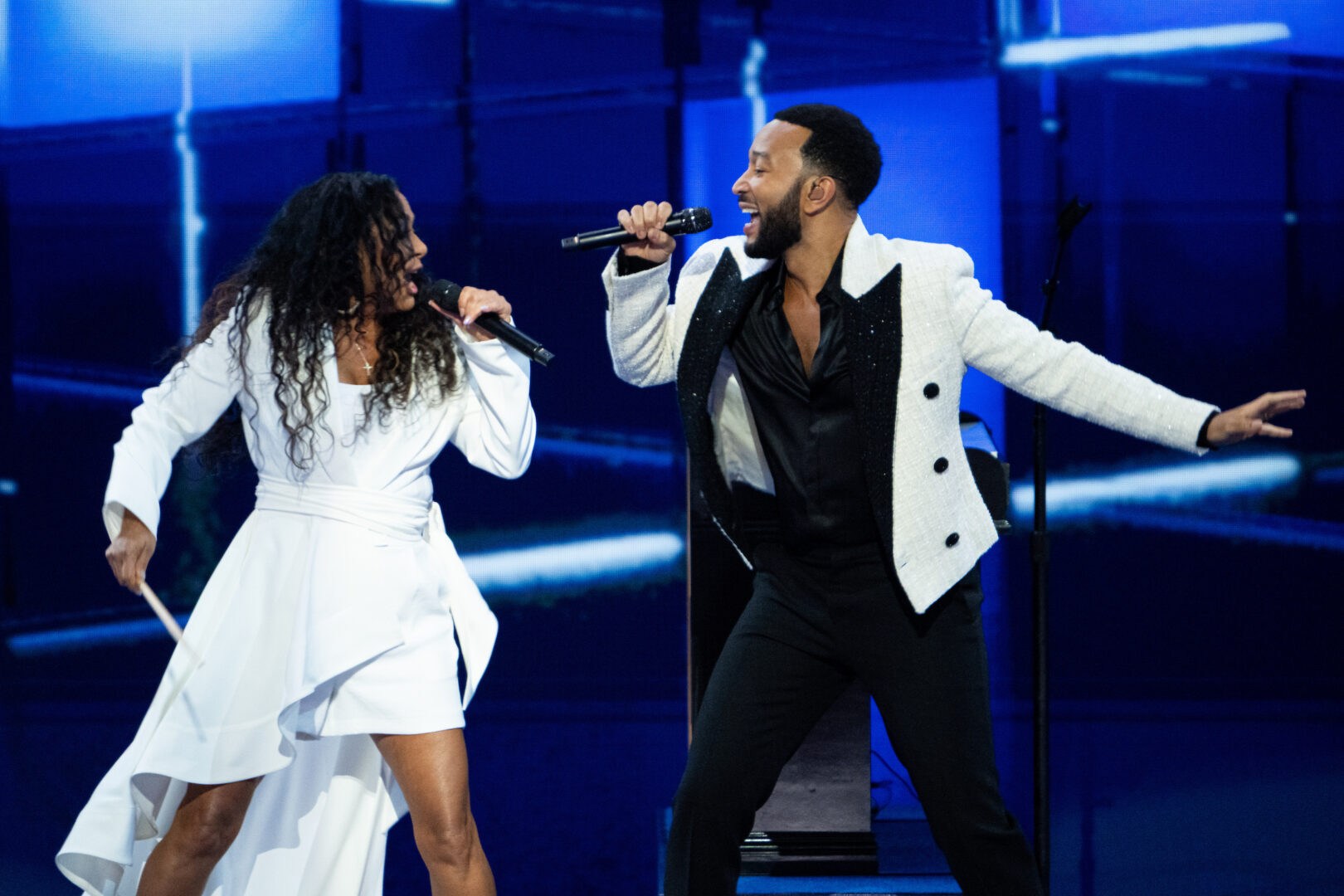 John Legend, joined by Sheila E., perform Prince’s “Let’s Go Crazy” during day three of the 2024 Democratic National Convention in Chicago on Wednesday. (Bill Clark/CQ Roll Call)