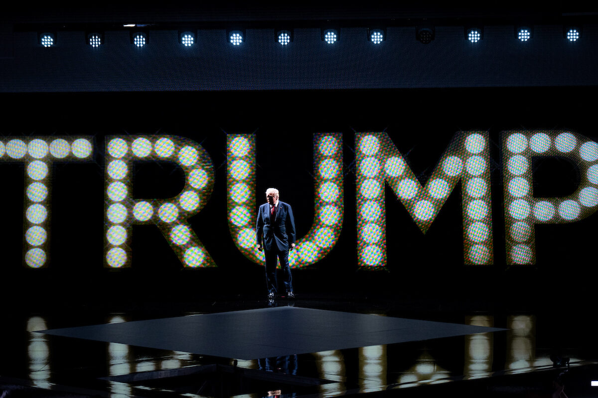 Former President Donald Trump arrives on stage to accept the Republican nomination for president to close the Republican National Convention in Milwaukee on Thursday. (Bill Clark/CQ Roll Call)