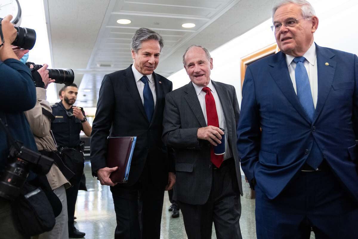 Secretary of State Antony J. Blinken, left, arrives to testify before the Senate Foreign Relations Committee on Tuesday.