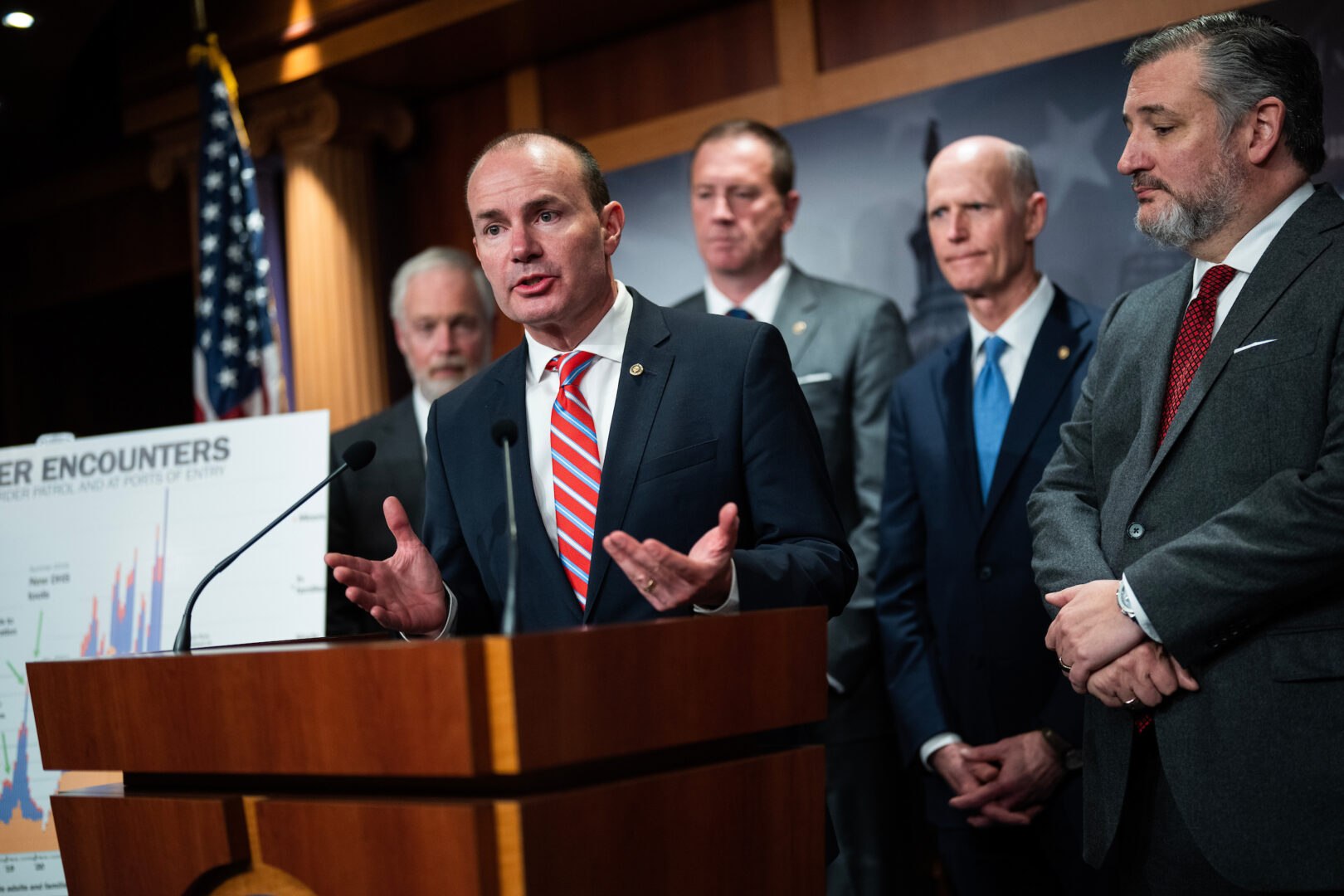 Sen. Mike Lee, R-Utah,  speaks during a news conference in the Capitol on border security legislation on Wednesday. Sens. Ron Johnson, R-Wis., Eric Schmitt, R-Mo., Rick Scott, R-Fla., and Ted Cruz, R-Texas, also appear. 