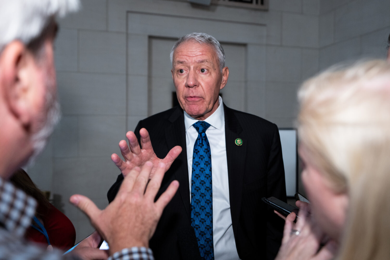 Rep. Ken Buck speaks to reporters after an Oct. 10 forum for candidates for House speaker in the Longworth House Office Building.