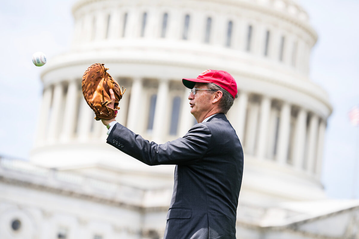 Rep. Tim Burchett, R-Tenn., plays catch with a reporter while being interviewed outside the Capitol on Thursday. Summer is almost here, and the news cycle is going to heat up.  