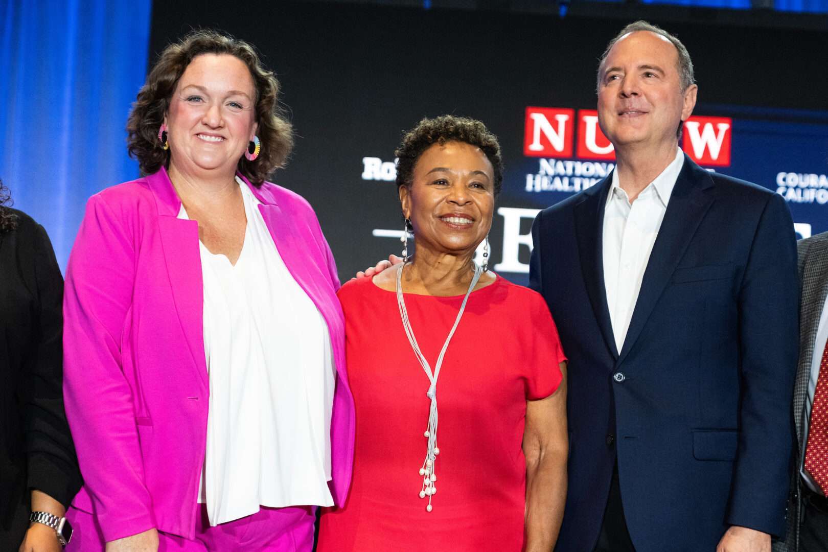 From left, California Democratic Reps. Katie Porter, Adam B. Schiff and Barbara Lee pose for a photo after the National Union of Healthcare Workers Senate Candidate Forum in downtown Los Angeles, on Sunday.