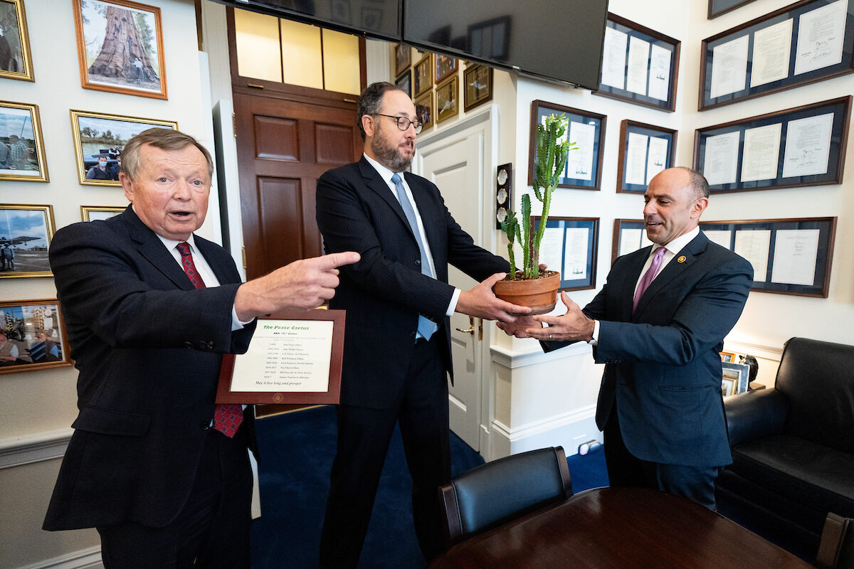 From left, former Rep. Earl Pomeroy points as Ben Rich, chief of staff for the late Rep. Bill Pascrell’s office, hands over the Pease Cactus to Rep. Jimmy Panetta in Panetta’s office in the Cannon House Office Building on Sept. 18. House Ways and Means Committee members whose first or last names start with “P” have passed along guardianship of the cactus for more than 30 years.