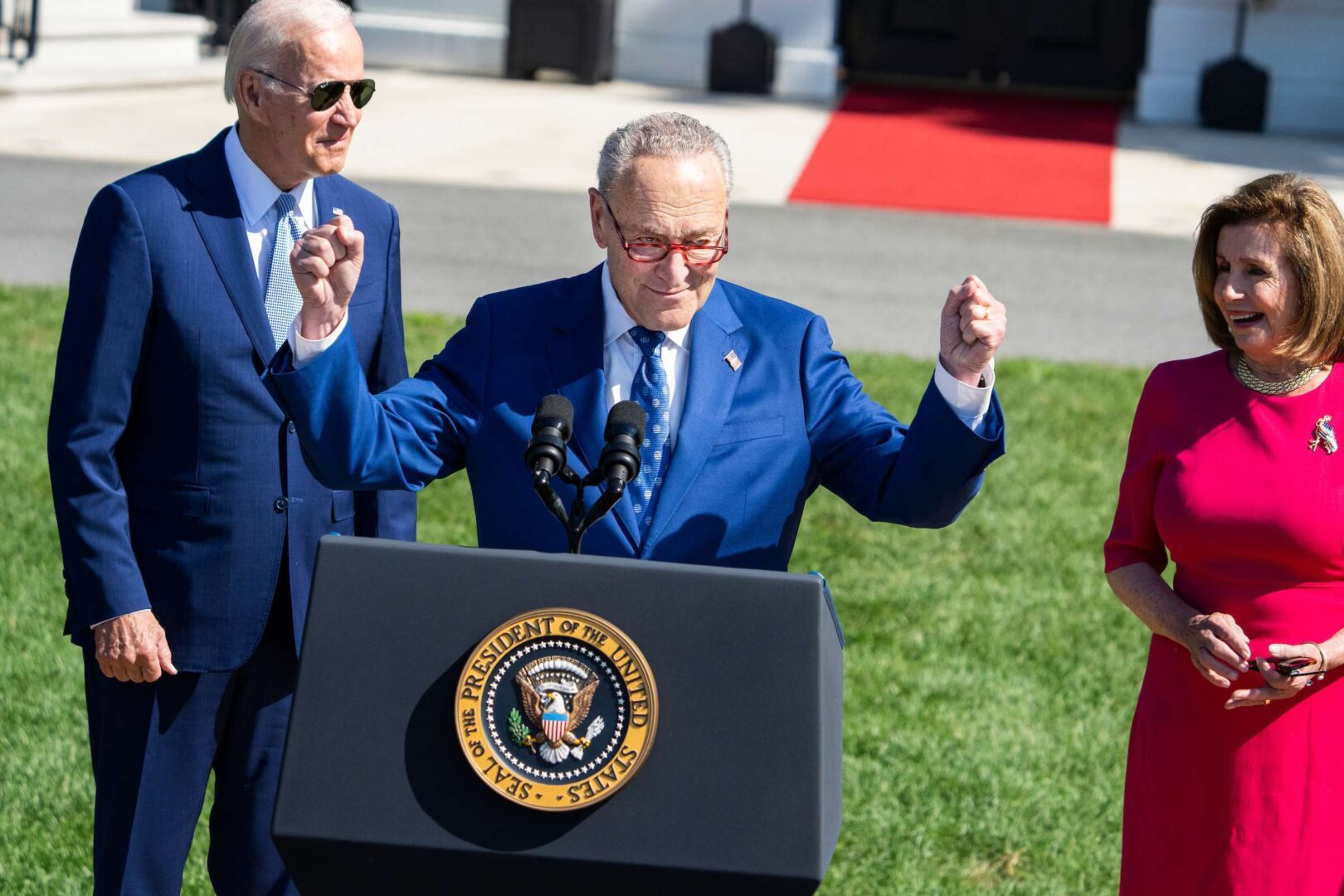 President Joe Biden, Senate Majority Leader Charles E. Schumer and Speaker Nancy Pelosi at the semiconductor legislation signing ceremony at the White House in August. A string of legislative accomplishments has coincided with a more favorable political environment for Democrats heading into the midterm elections. 