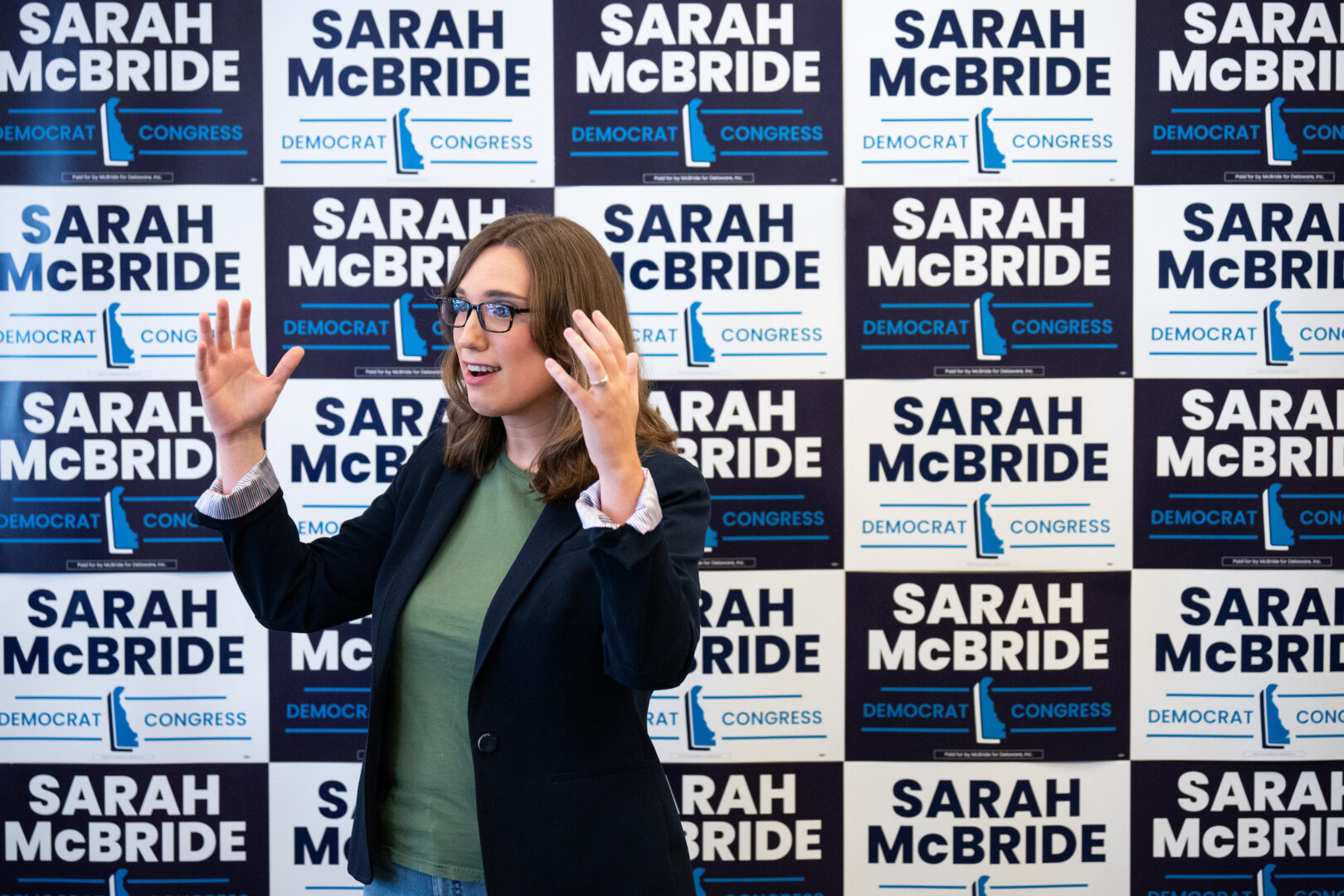 Sarah McBride speaks to volunteers at her campaign office in Wilmington on July 27. A state senator since 2021, she’s now campaigning for Congress. 