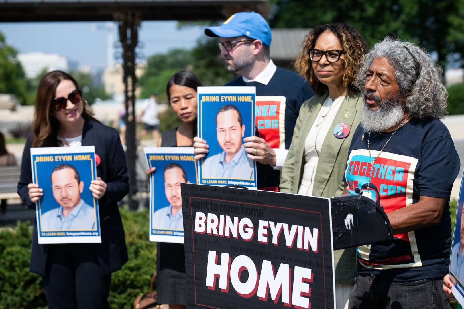 Pedro Martinez, right, calls for the release of his son, Eyvin Hernandez, at a rally at the Capitol on Tuesday alongside Rep. Sydney Kamlager-Dove, D-Calif.