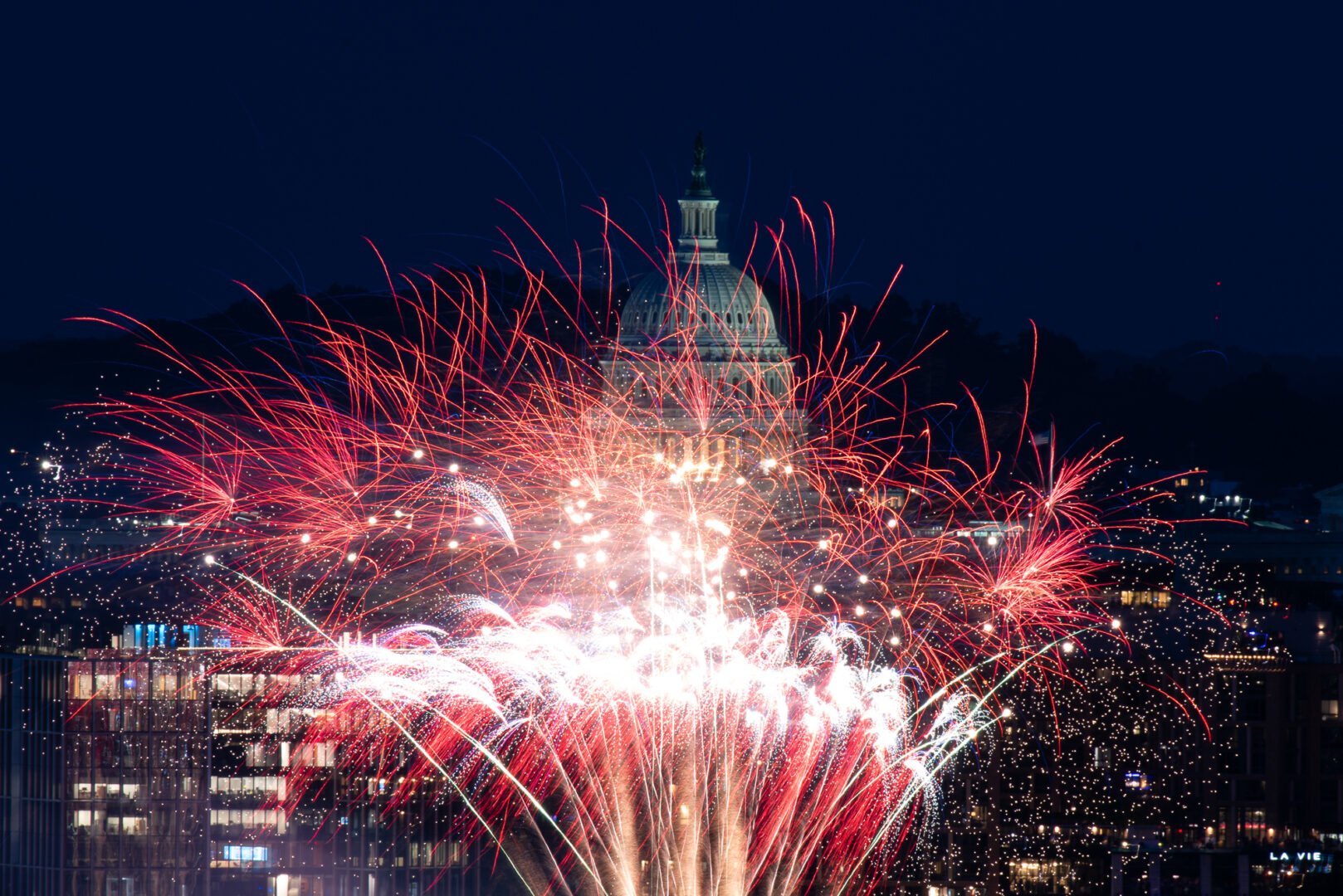 Fireworks explode over the Potomac River with the Capitol Dome in the background, marking the end of Clipper Race Fleet Week at The Wharf in Washington on Tuesday evening. The 11-ship fleet from the biennial race was docked at The Wharf.