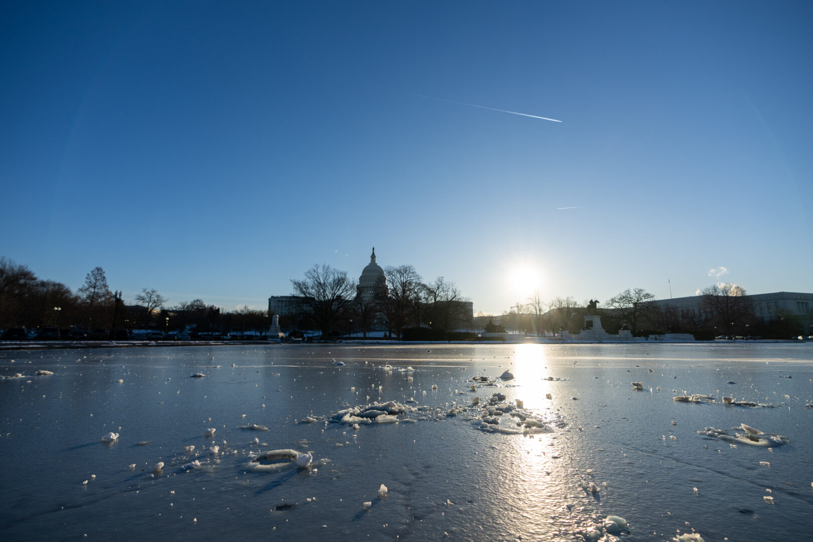 The U.S. Capitol stands behind a frozen reflecting pool on Monday. (Bill Clark/CQ Roll Call)