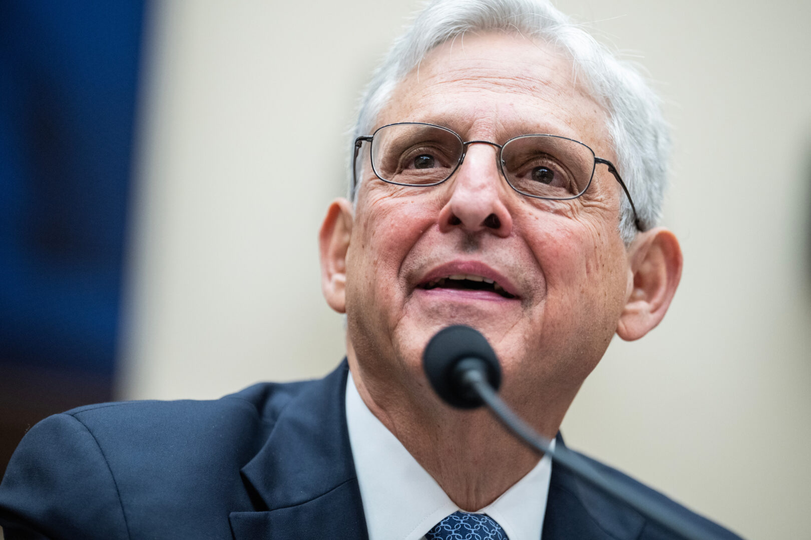 Attorney General Merrick B. Garland accused Apple of  "exclusionary anticompetitive conduct." 