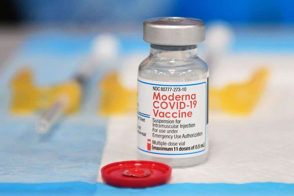 A Moderna COVID-19 vaccine awaits administration at a vaccination clinic in Los Angeles. A CDC advisory panel on Thursday recommended boosters designed to better respond to newer variants of the coronavirus.