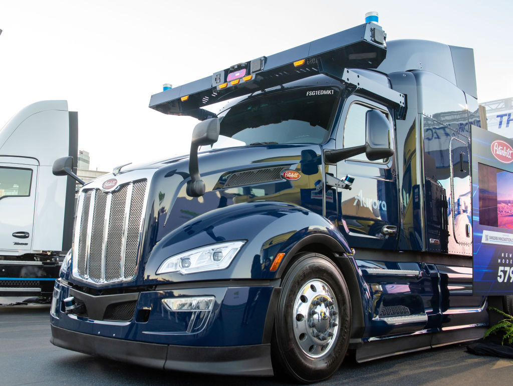 Robotic truck company Aurora shows off a self-driving semi-truck at the CES tech show in Las Vegas in 2022.