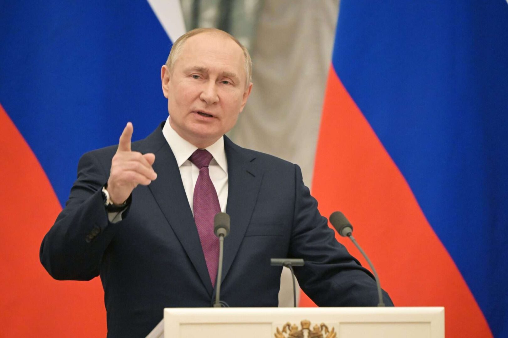 Russian President Vladimir Putin speaks during a joint news conference with Germany's Chancellor Olaf Scholz following their talks about the Ukraine crisis.