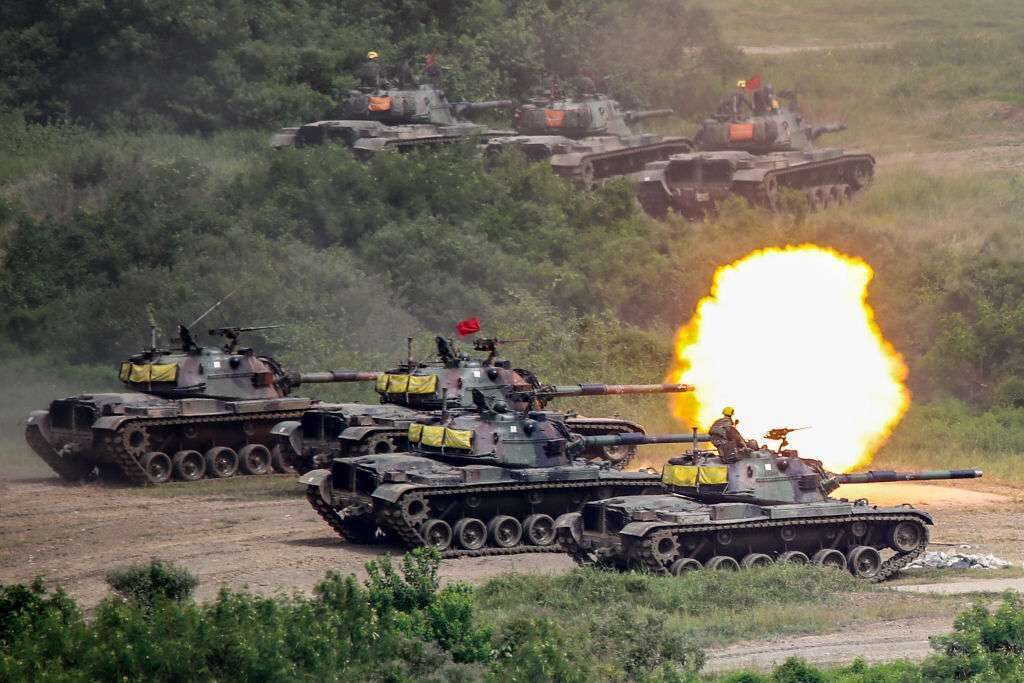 CM-11 tanks fire artillery during live-fire drills in Taiwan on Sept. 7 amid intensifying invasion threats from China.