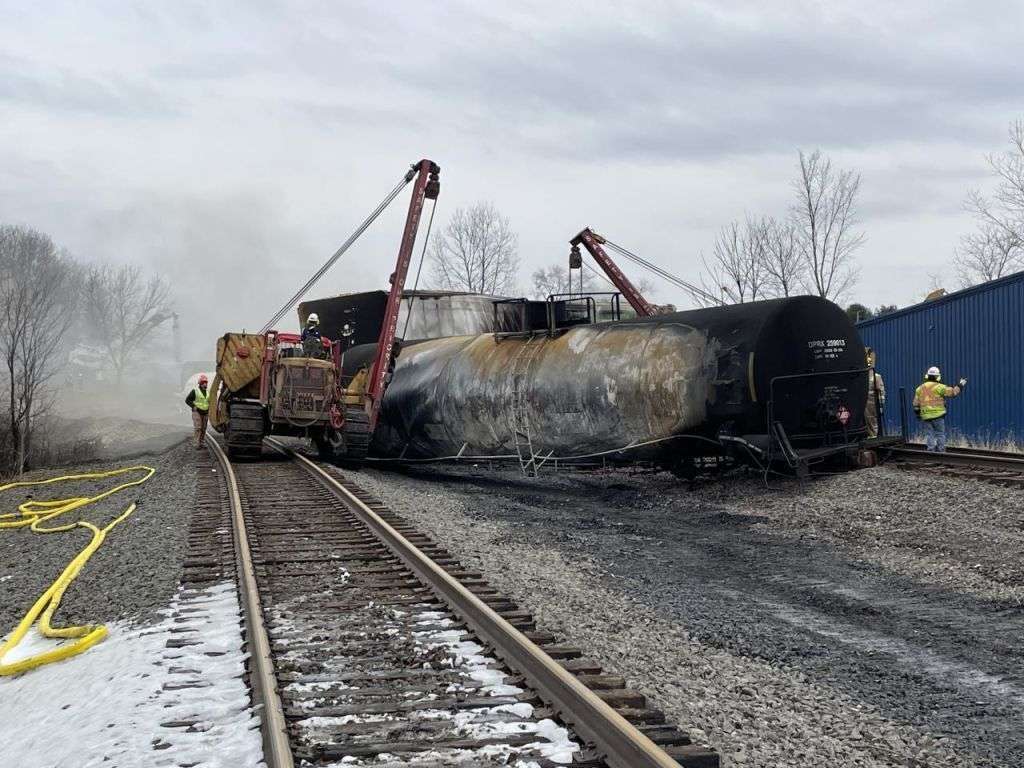 Officials on Feb. 17 conduct operations and inspect the area after the train derailment in East Palestine on Feb. 3.