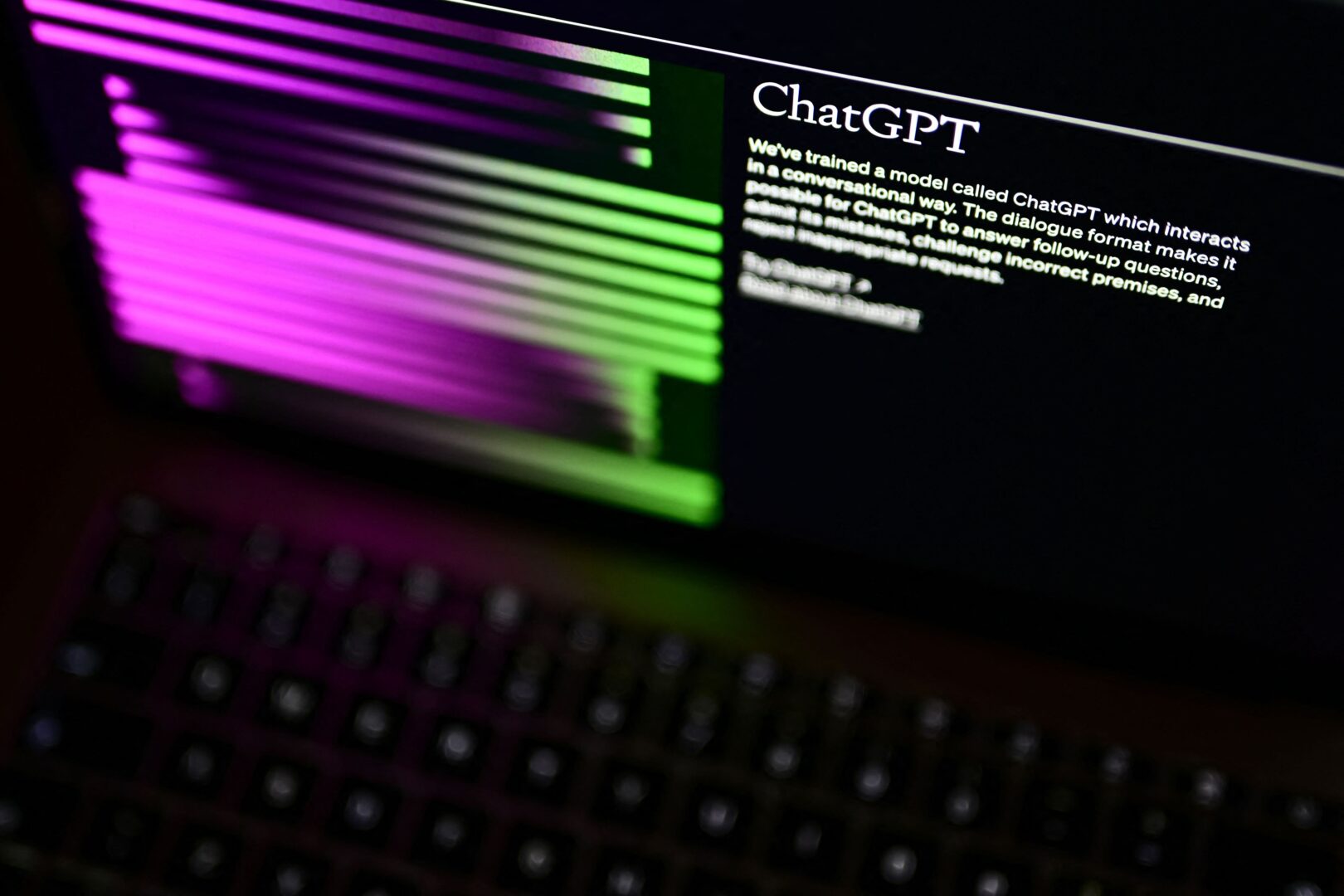 A computer screen with the home page of the OpenAI website displays ChatGPT, a generative artificial intelligence model.