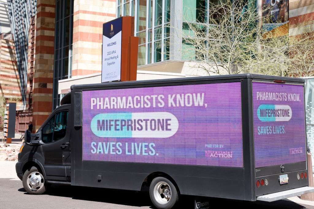 UltraViolet advocates are seen at the American Pharmacists Association Annual Conference at the Phoenix Convention Center on March 25, urging pharmacists to reaffirm that mifepristone, a medication abortion drug, is safe, effective and essential. 