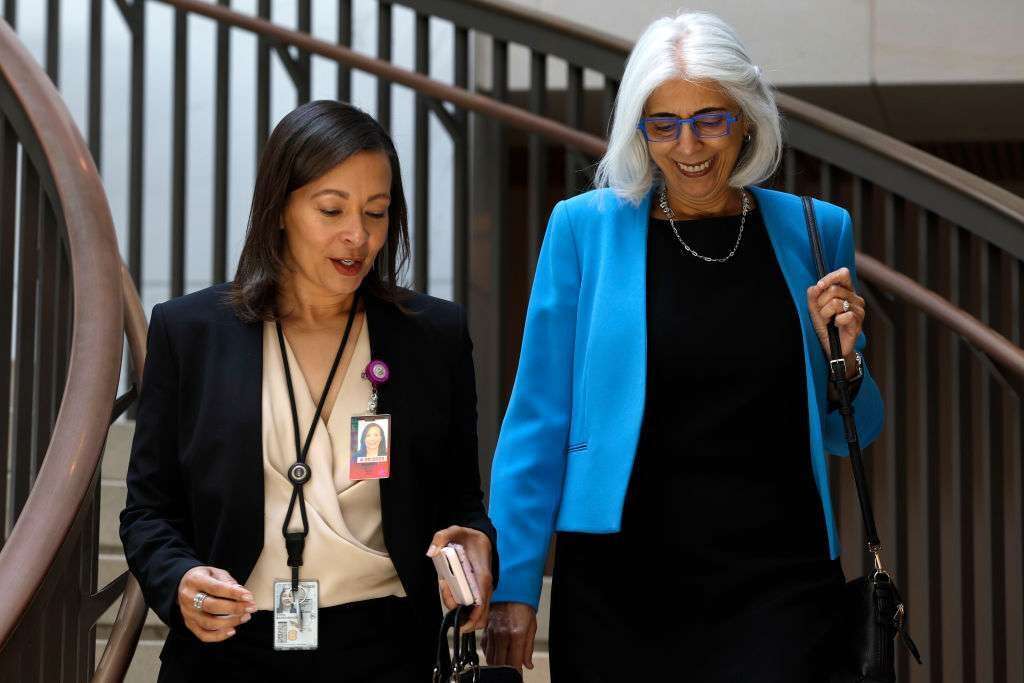 Arati Prabhakar, right, the director of the White House Office of Science and Technology Policy, said the contest would be a collaboration between the government and four AI companies. 