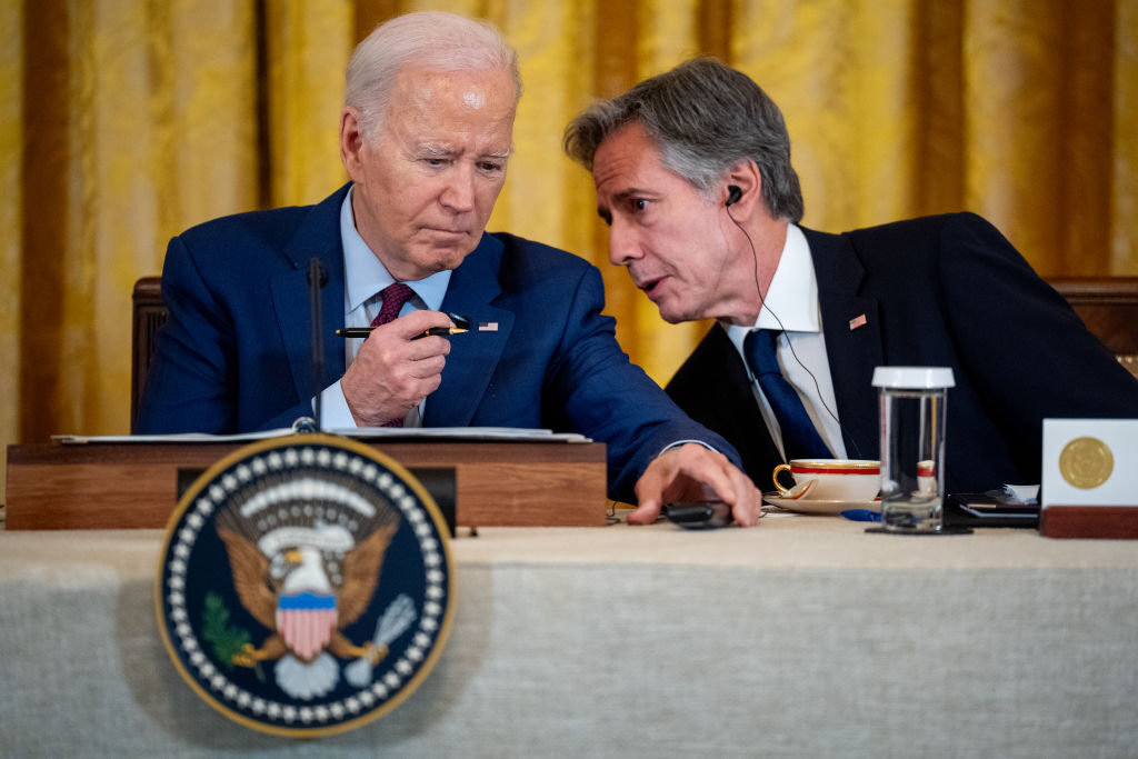 President Joe Biden speaks with Secretary of State Antony J. Blinken during a meeting with Japanese Prime Minister Fumio Kishida and Ferdinand Marcos Jr., president of the Phillipines, in the East Room of the White House on Thursday.