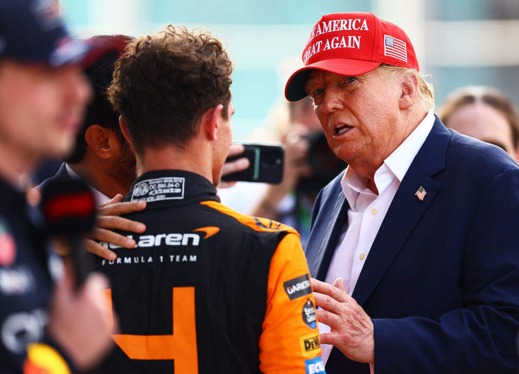 Former President Donald Trump talks with race winner Lando Norris at the Formula One Grand Prix of Miami on Sunday. President Joe Biden’s campaign says Florida is in play.