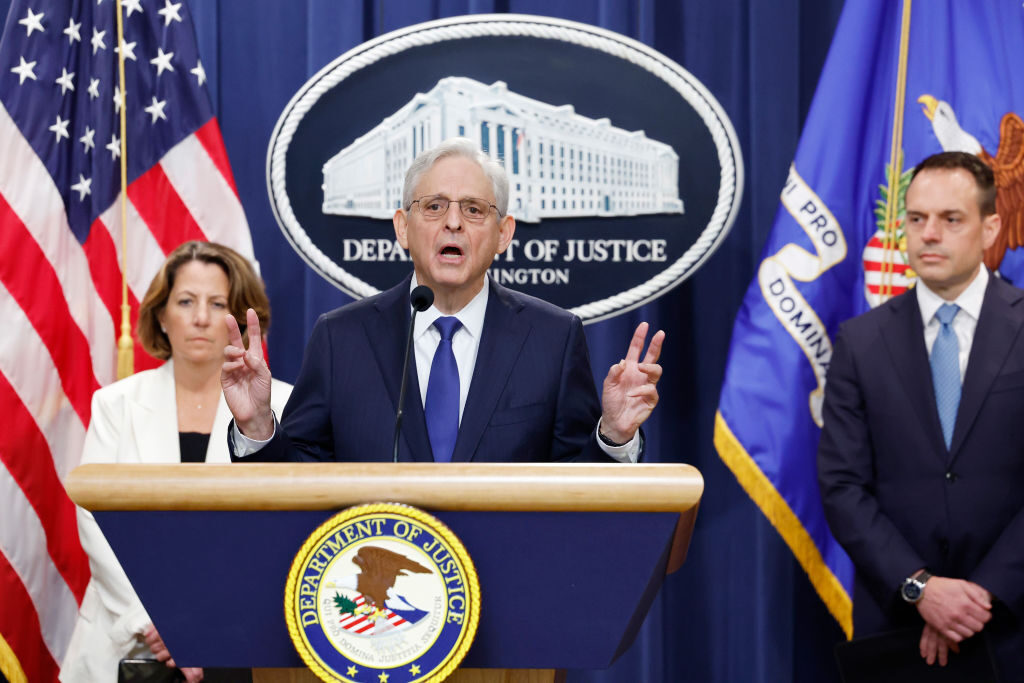 Attorney General Merrick B. Garland speaks alongside Deputy Attorney General Lisa Monaco, left, and Acting Associate Attorney General Benjamin Mizer during a press conference on the RealPage lawsuit at the Justice Department on Friday. (Anna Moneymaker/Getty Images)