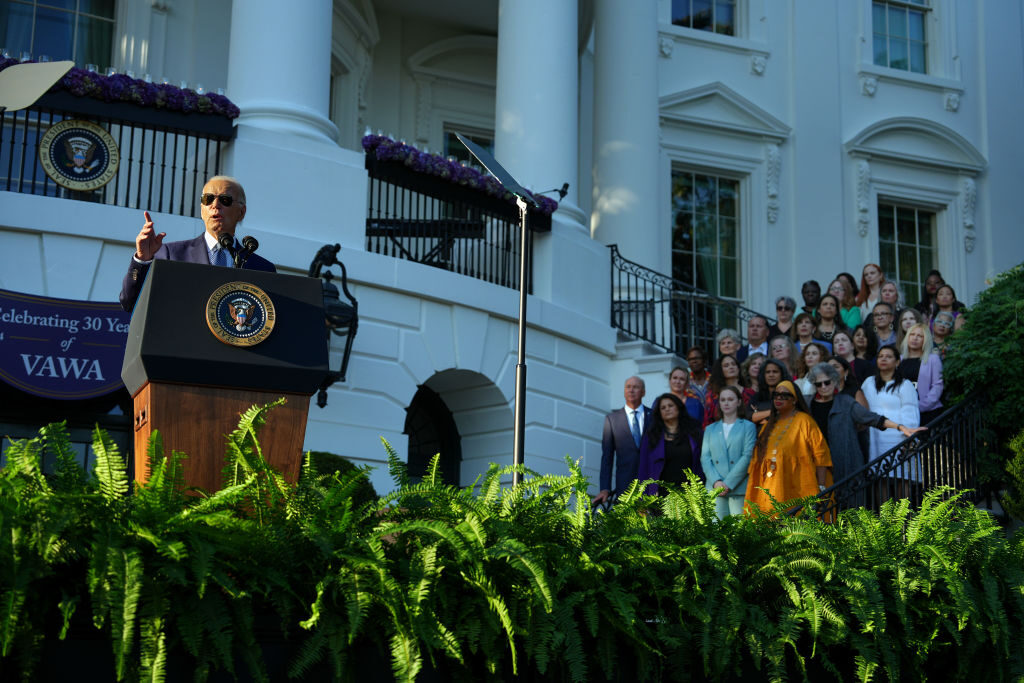 President Joe Biden, joined by survivors of domestic violence, speaks during an event marking the 30th anniversary of the Violence Against Women Act. (Andrew Harnik/Getty Images)