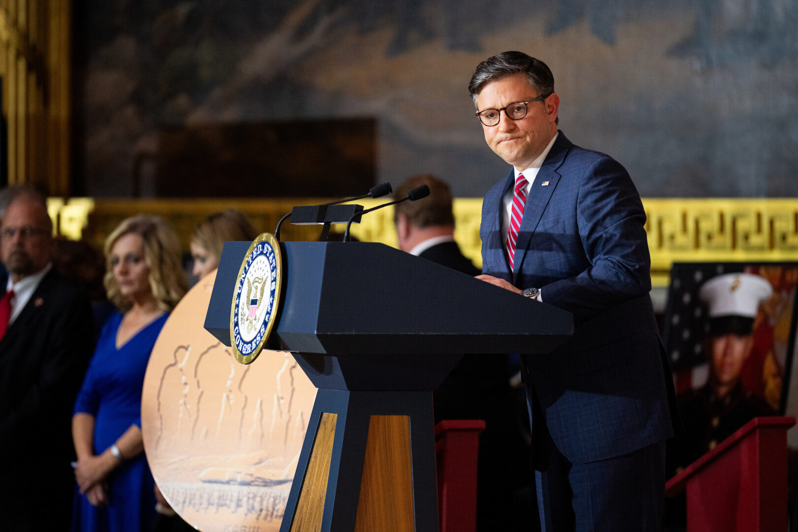 Speaker Mike Johnson, R-La., speaks during the Congressional Gold Medal ceremony for fallen servicemembers killed in the 2021 terrorist attack at the airport in Kabul, Afghanistan, in the Capitol Rotunda on Tuesday. 