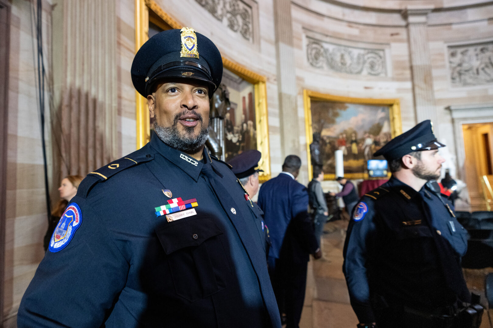 Harry Dunn arrives for a ceremony on Dec. 6, 2022, honoring police officers with a Congressional Gold Medal for defending the Capitol on Jan. 6. 