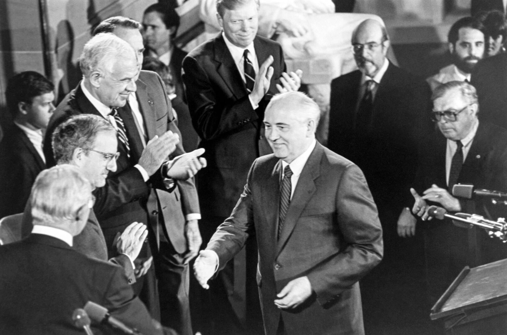 Mikhail Gorbachev, former president of the Soviet Union, greets lawmakers in Statuary Hall after his address to Congress on May 14, 1992. Also seen are, from left, Rep. Robert H. Michel, R-Ill., Sen. George J. Mitchell, D-Maine, Speaker Tom Foley, D-Wash., Sen. Bob Dole, R-Kan., Rep. Dick Gephardt, R-Mo., Sergeant-at-Arms Werner Brandt and House Doorkeeper James T. Molloy.