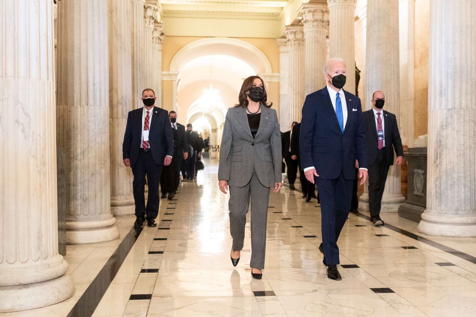 Vice President Kamala Harris and President Joe Biden leave the Capitol following Biden's speech in Statuary Hall on Jan. 6. 