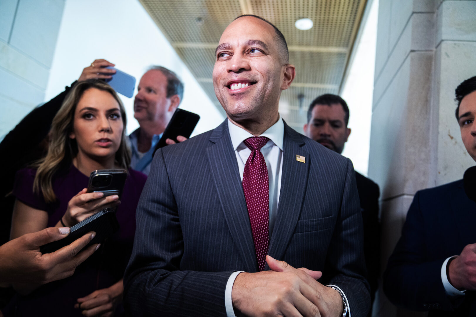 House Minority Leader Hakeem Jeffries, D-N.Y., talks with reporters in the  Capitol on Thursday.