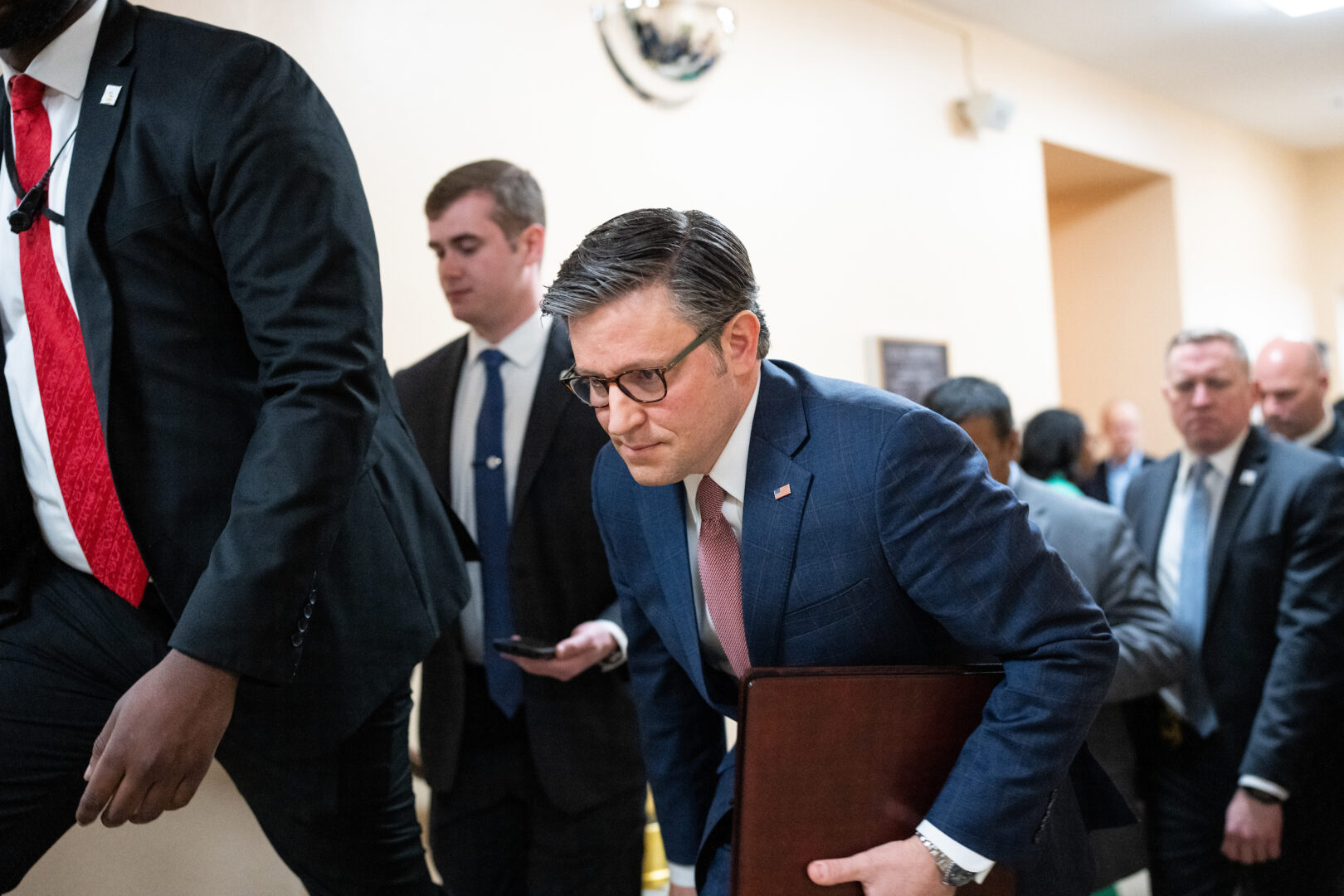 Speaker Mike Johnson, R-La., leaves the House Republican Conference meeting in the Capitol on Wednesday. 