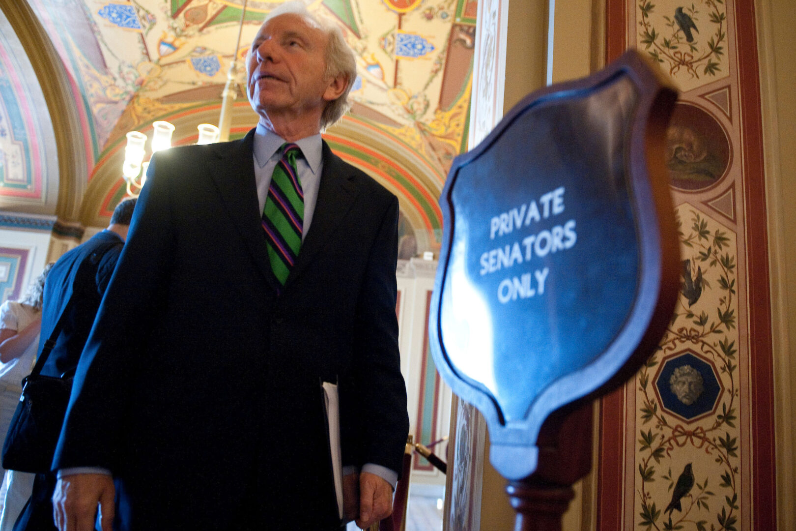 Sen. Joseph I. Lieberman is pictured near the stairs to the Senate floor in the Capitol on June 13, 2010. The former Connecticut Democratic senator died Wednesday at the age of 82.