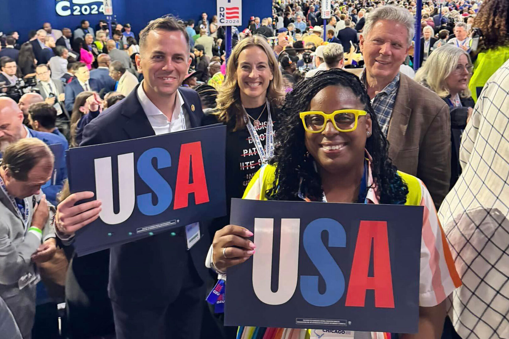 House candidate LaMonica McIver, front right, poses with, from left, New Jersey Democratic Reps. Rob Menendez, Mikie Sherrill and Frank Pallone Jr. during the Democratic National Convention in Chicago.