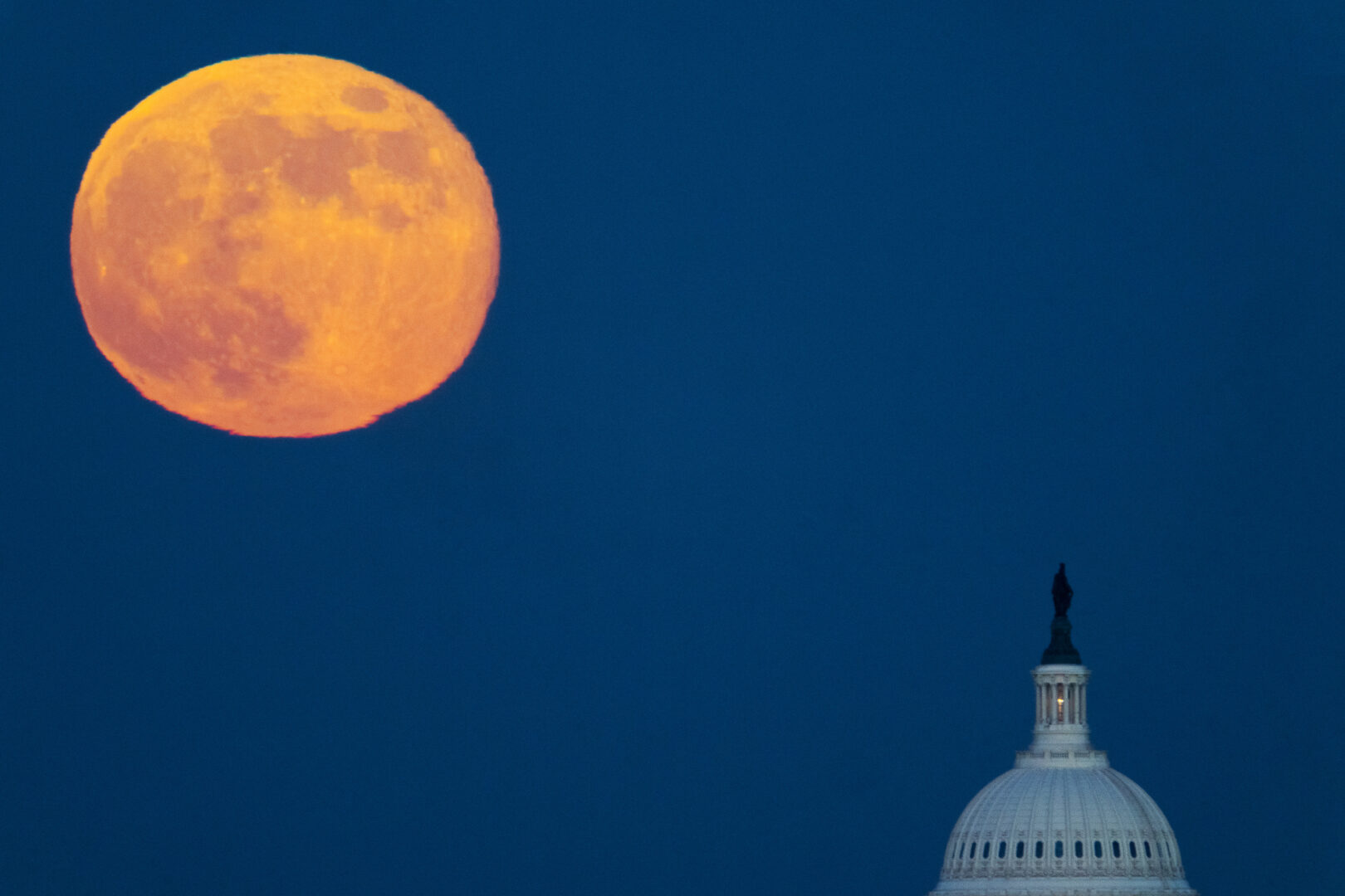 The November full moon, also known as the Beaver Moon, rises over the Capitol dome on Monday.