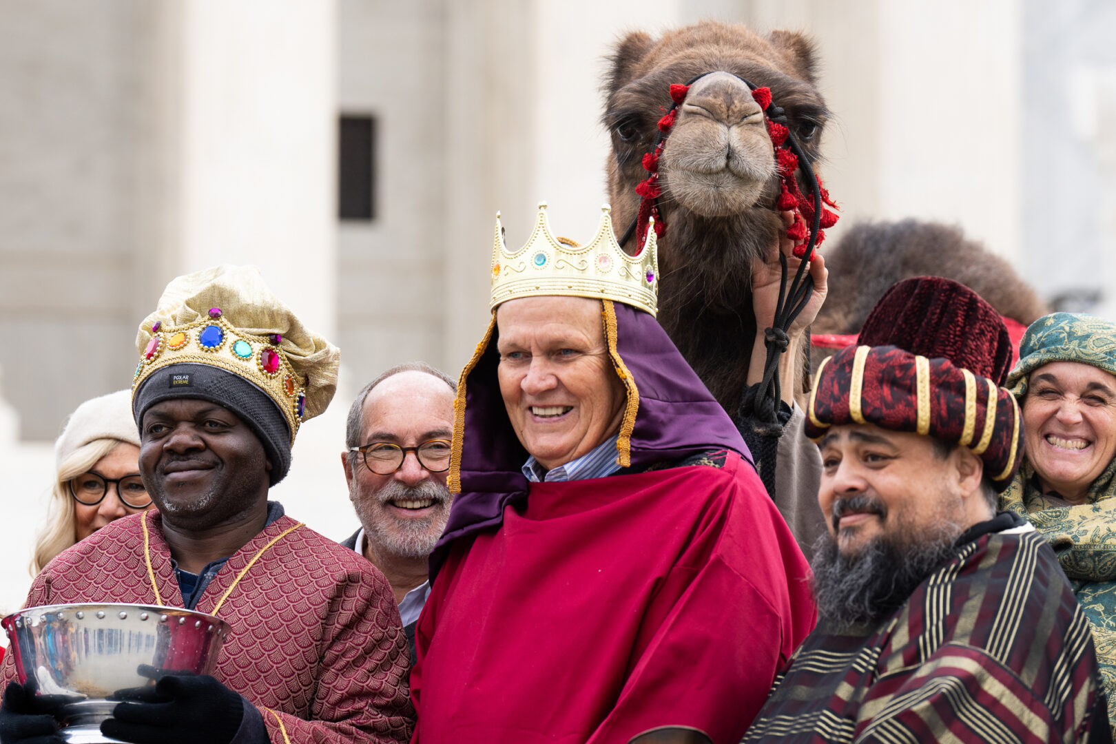 Faith & Liberty holds its 20th annual live nativity in front of the U.S. Supreme Court on Thursday. The nativity scene included people portraying Mary, Joseph, the Baby Jesus, Wise Men, townspeople, and shepherds in first-century attire, along with Delilah the camel, a donkey and sheep. (Bill Clark/CQ Roll Call)