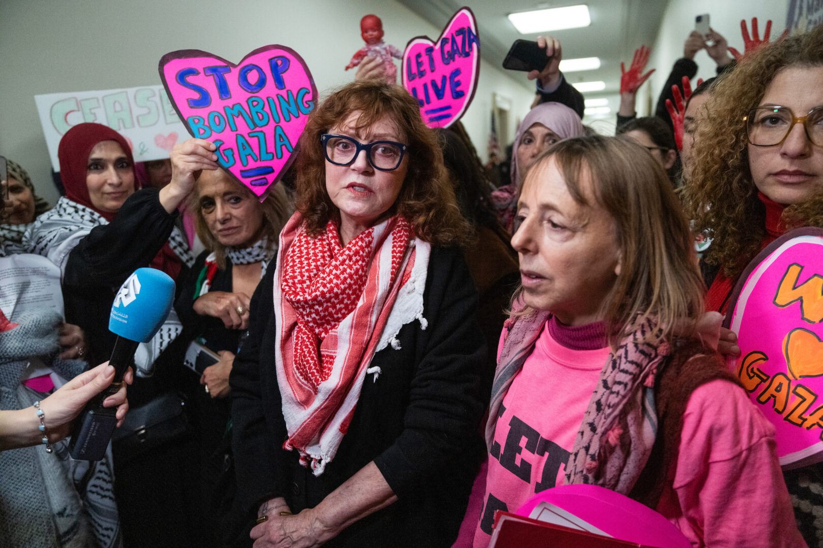 Actress and activist Susan Sarandon addresses the media with Medea Benjamin of Code Pink, right, on Capitol Hill on Thursday.