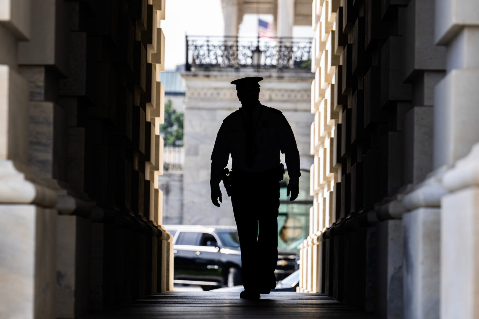 A member of the Capitol Police is seen in the Senate carriage entrance of the Capitol on Sept. 21, 2023.