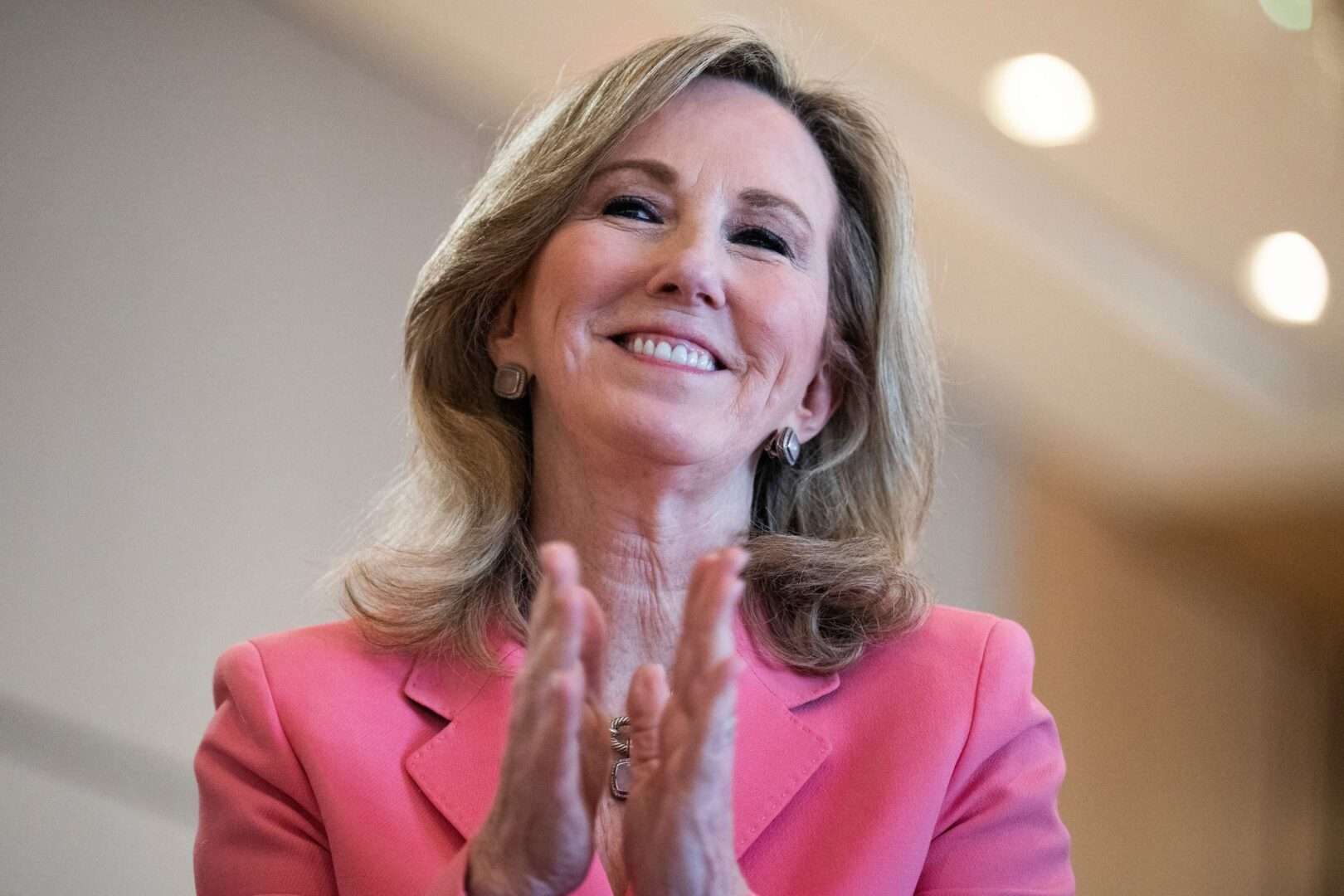 Former Rep. Barbara Comstock, R-Va., listens to former Rep. Adam Kinzinger, R-Ill., speak during the Principles First 2023 Summit in Washington on March 5.