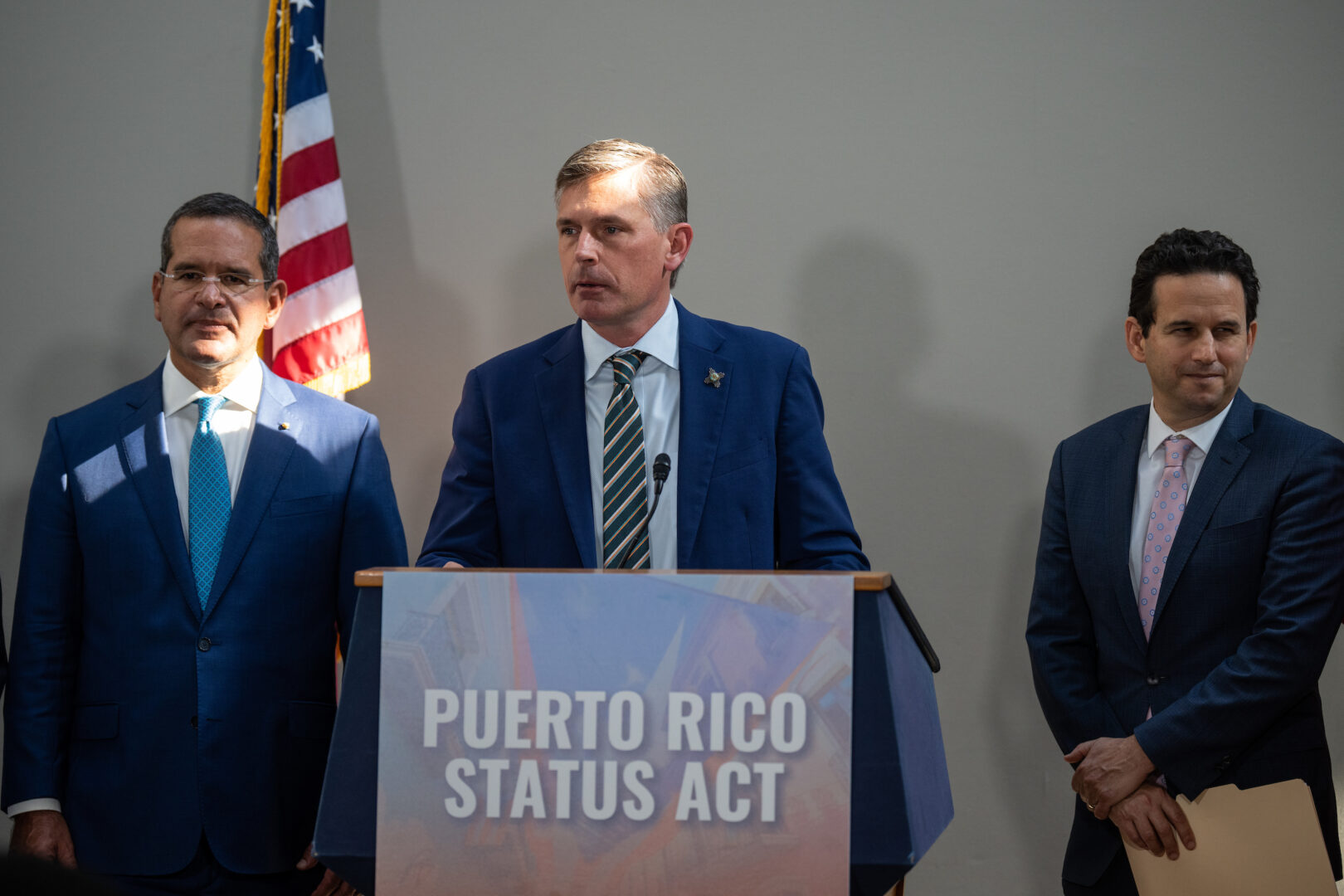 Sen. Martin Heinrich is leading a new push in the Senate to change the status of Puerto Rico. Above, he describes his bill Wednesday, with Puerto Rico Gov. Pedro Pierluisi on the left and Sen. Brian Schatz on the right.