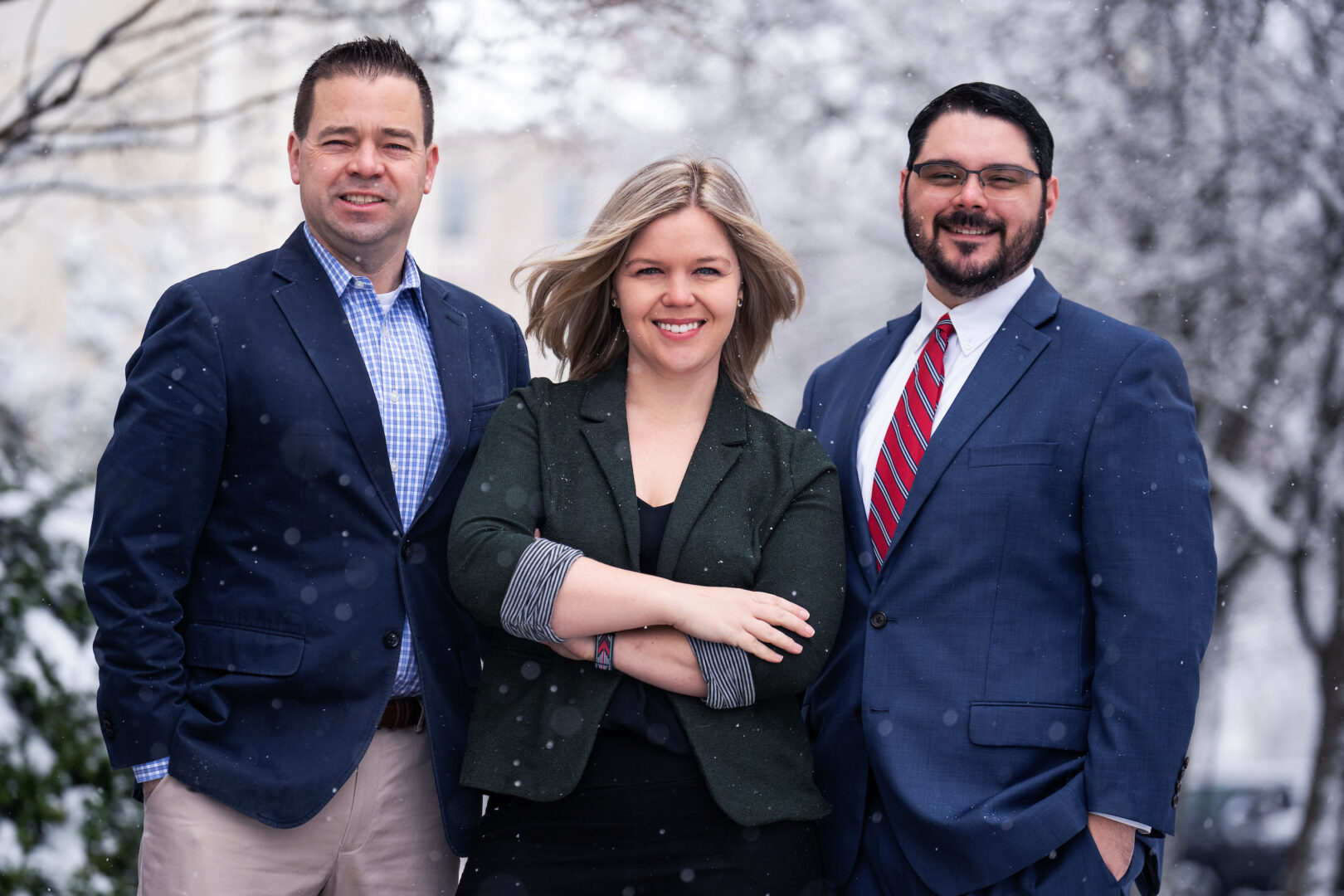 Former Hill staffers Dan Lips, Aubrey Wilson and J.D. Rackey are seen on Capitol Hill on Jan. 19. Each now works for a group that is out to improve the federal government.