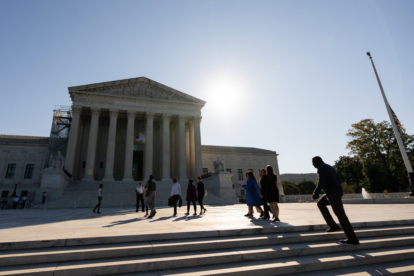 Visitors walk across the Supreme Court plaza last October. The court is expected to issue a decision soon that could discard or limit the Chevron doctrine.