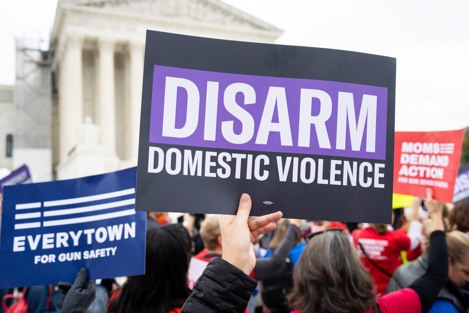 Activists rally outside the U.S. Supreme Court in November before the start of oral arguments in the United States v. Rahimi case over gun rights. 