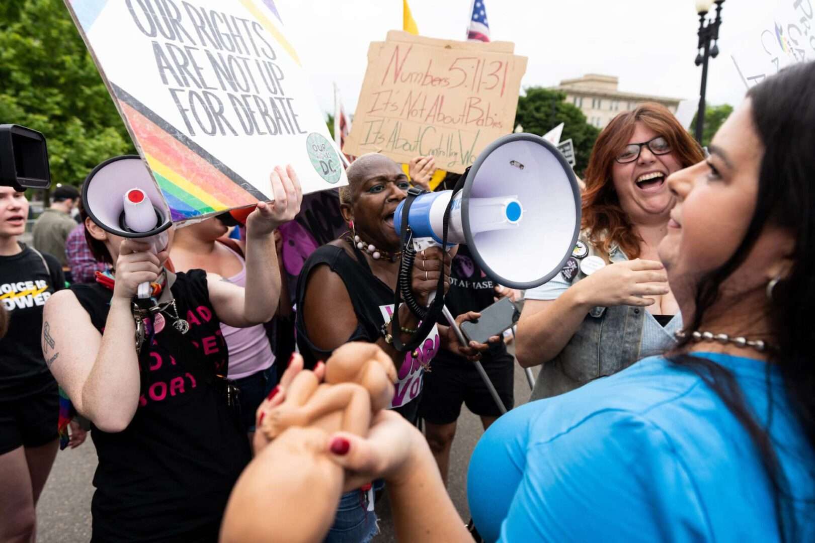 Protesters face off outside the Supreme Court as they wait for its decision in the Dobbs abortion case on June 21, 2022.