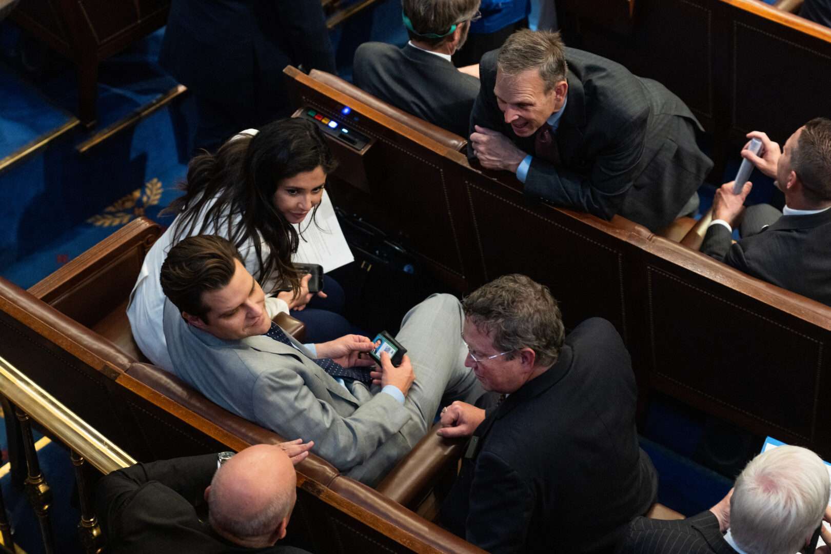 Florida Rep. Matt Gaetz, center, and other lawmakers are seen on the House floor during a vote in May. The turmoil Gaetz set off this month is a symptom of larger structural problems, some congressional observers say.