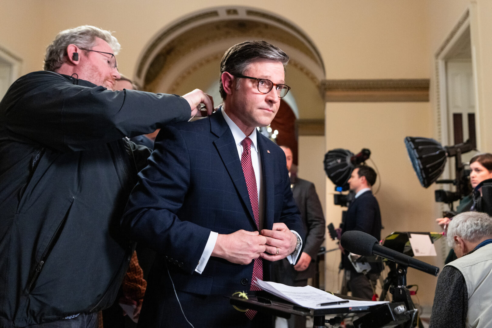 Speaker Mike Johnson, R-La., arrives for an interview with CNN in the Will Rogers corridor in the Capitol on Wednesday.