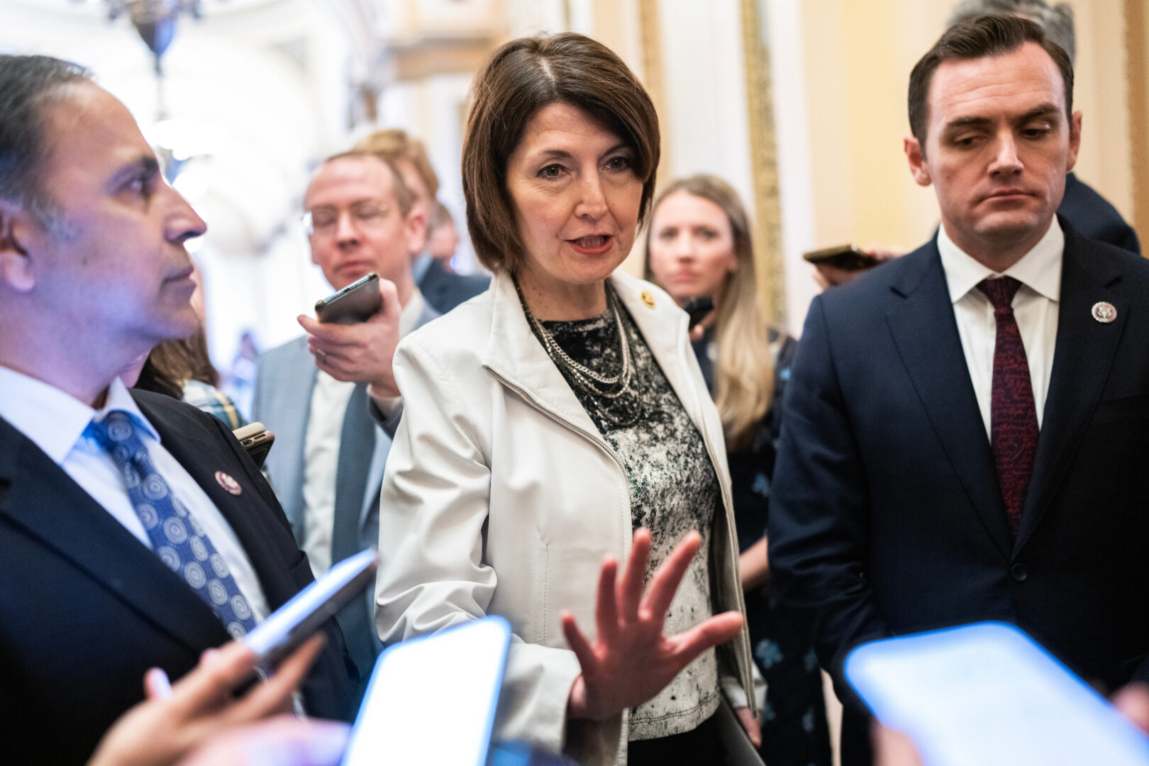 Rep. Cathy McMorris Rodgers, center, has draft legislation on a federal privacy standard that’s the subject of intense debate over its scope.