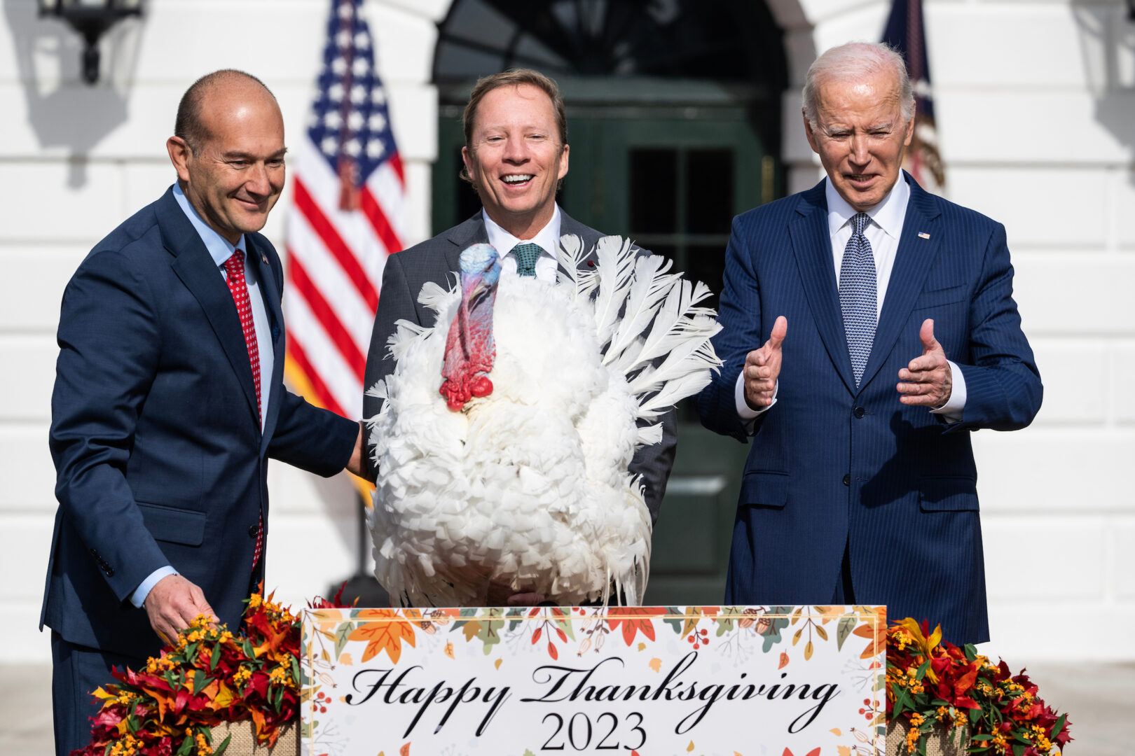 President Joe Biden pardons the turkey, Liberty, from Willmar, Minn., during the National Thanksgiving Turkey Pardoning on the South Lawn of the White House on Monday Nov. 20, 2023. Steve Lykken, center, chairman of the National Turkey Federation, and Jose Rojas, vice president of Jennie-O Turkey Store, also appear.