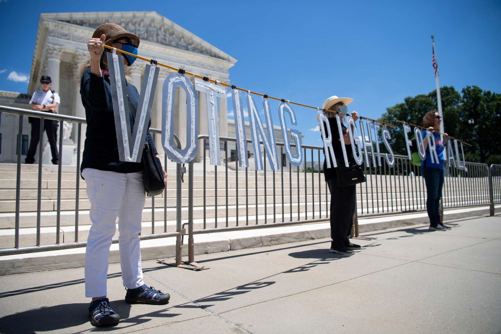 Demonstrators participate in a June 23 rally outside the Supreme Court held by the Poor People’s Campaign, calling for elimination of the legislative filibuster and passage of the "For The People" bill to overhaul voting rights, ethics and campaign finance laws. 