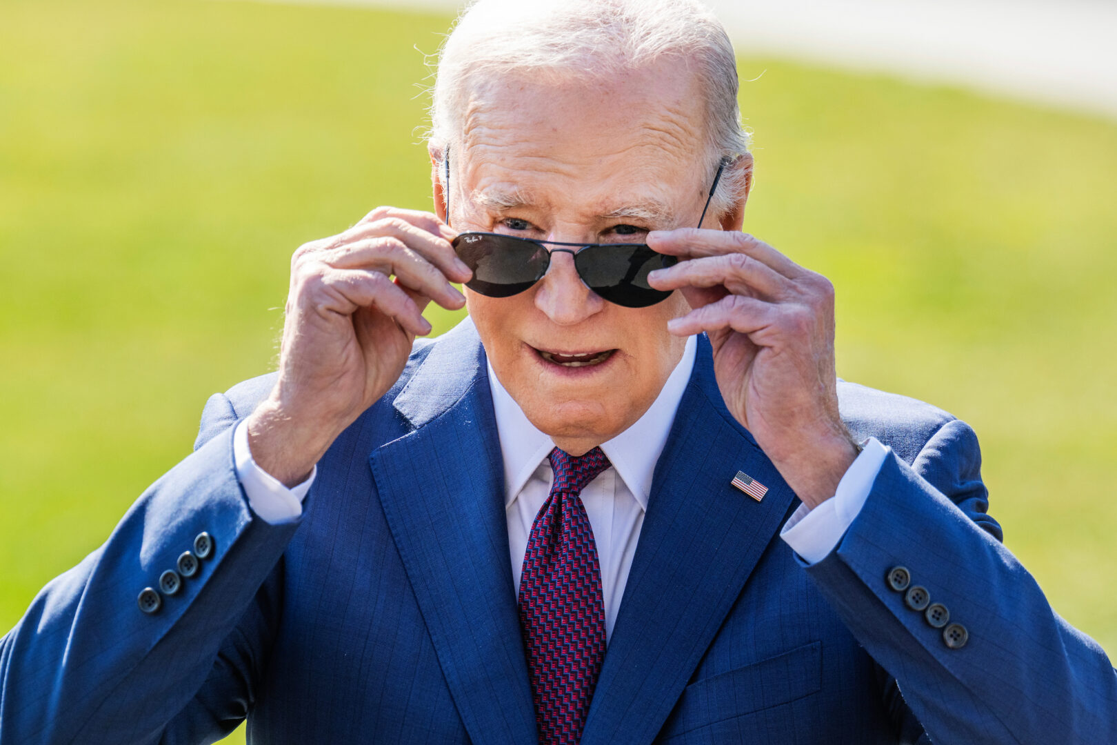 President Joe Biden addresses reporters on the South Lawn of the White House before boarding Marine One for a trip to Los Angeles for a campaign reception on Feb. 20. 